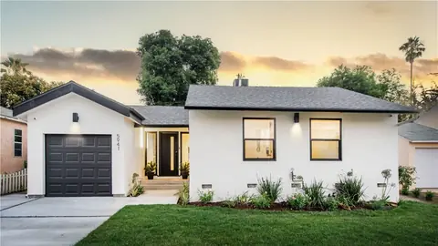 Finished single-family home exterior at dusk, Encino