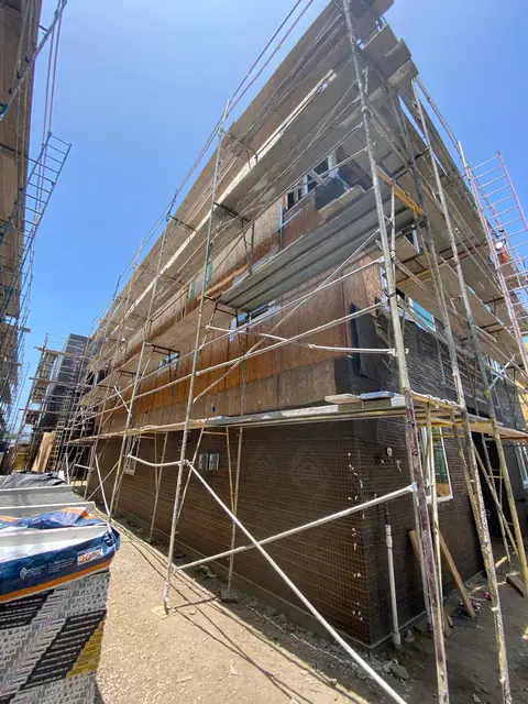 New duplex under construction with scaffolding, North Hollywood